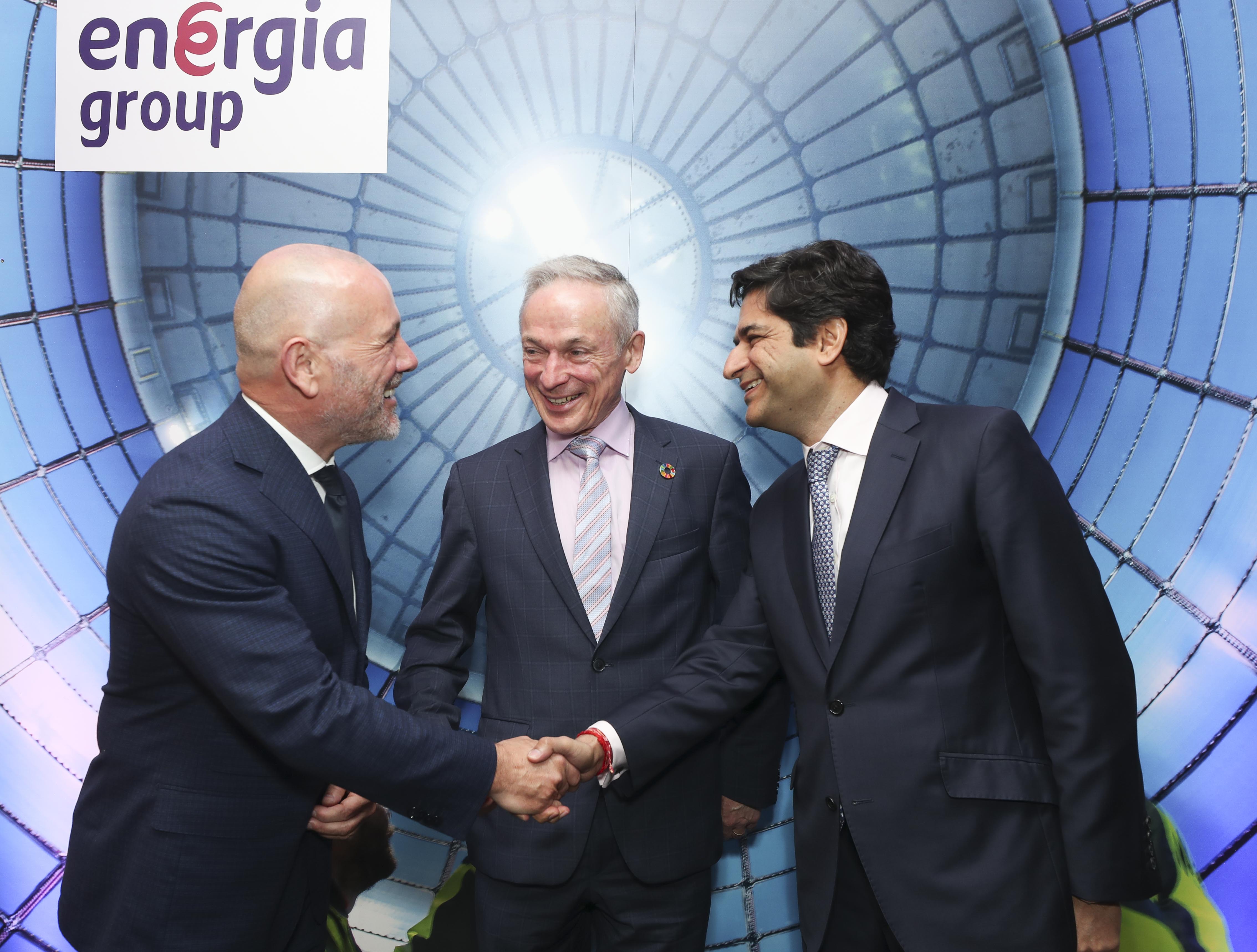 Group CEO Ian Thom, Minister Richard Bruton and Dr Gautam Bhandari at Energia HQ 